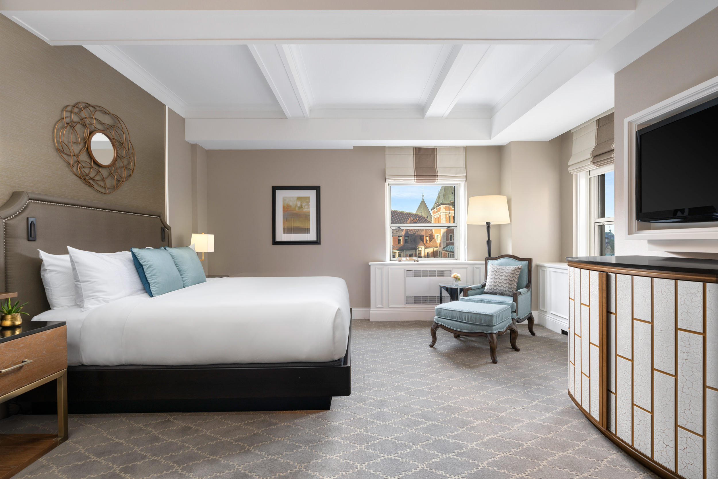 Tan bedroom with hints of pale blue