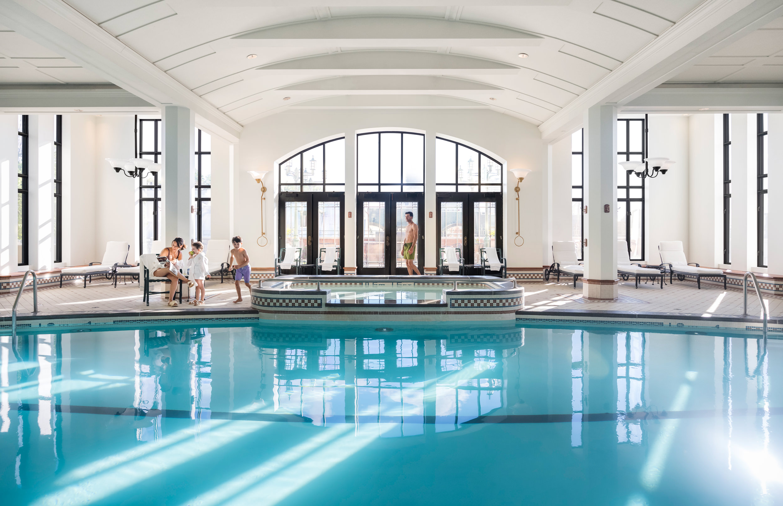 family at the indoor pool and hottub