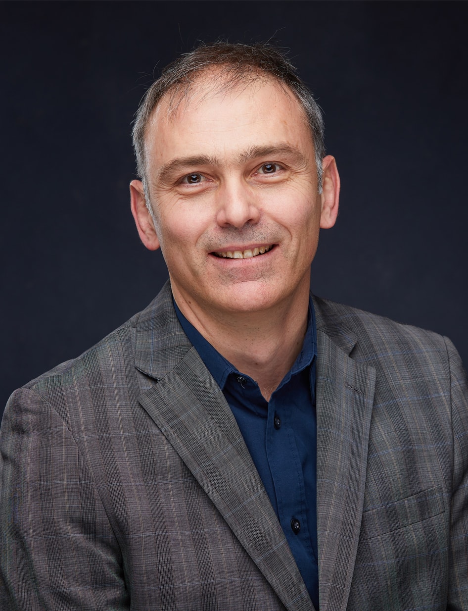 headshot of jean-marc