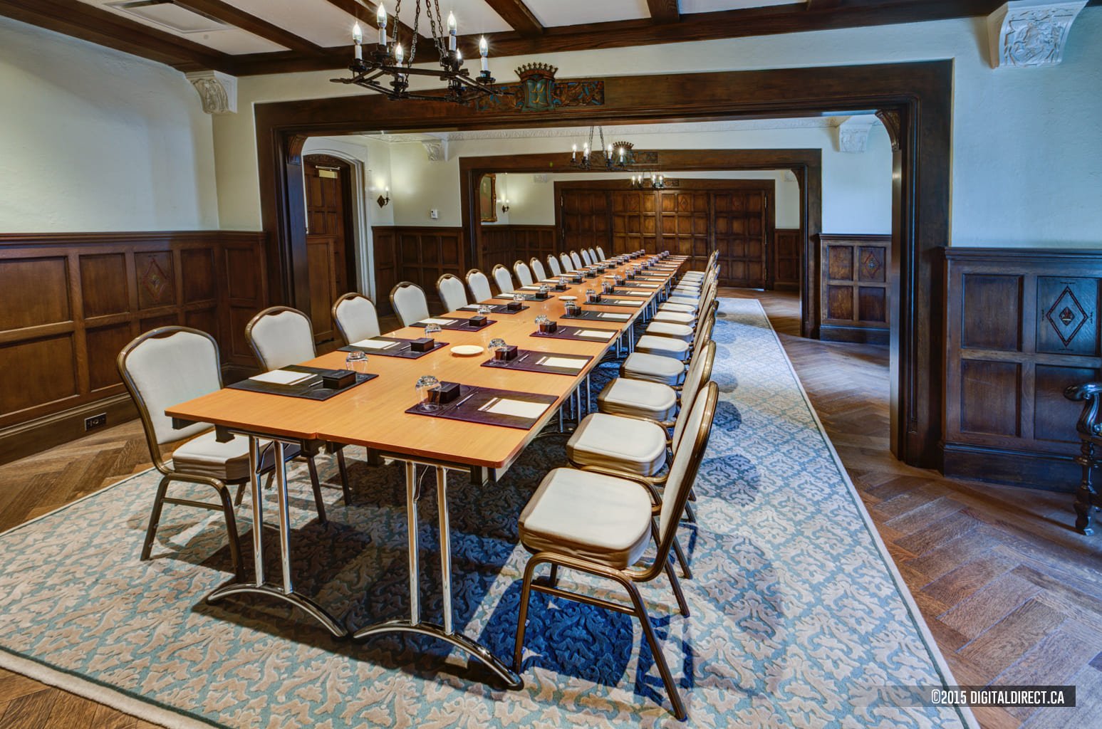 Room set up with long table for large meeting