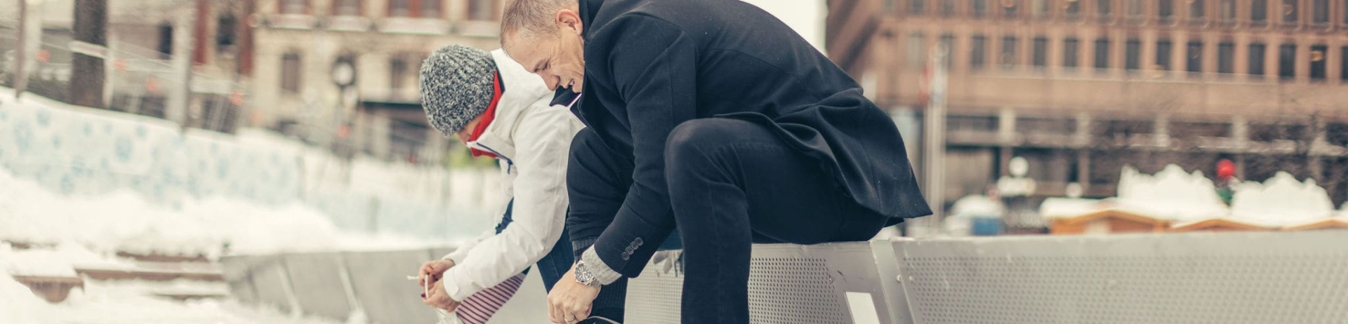 people putting on skates