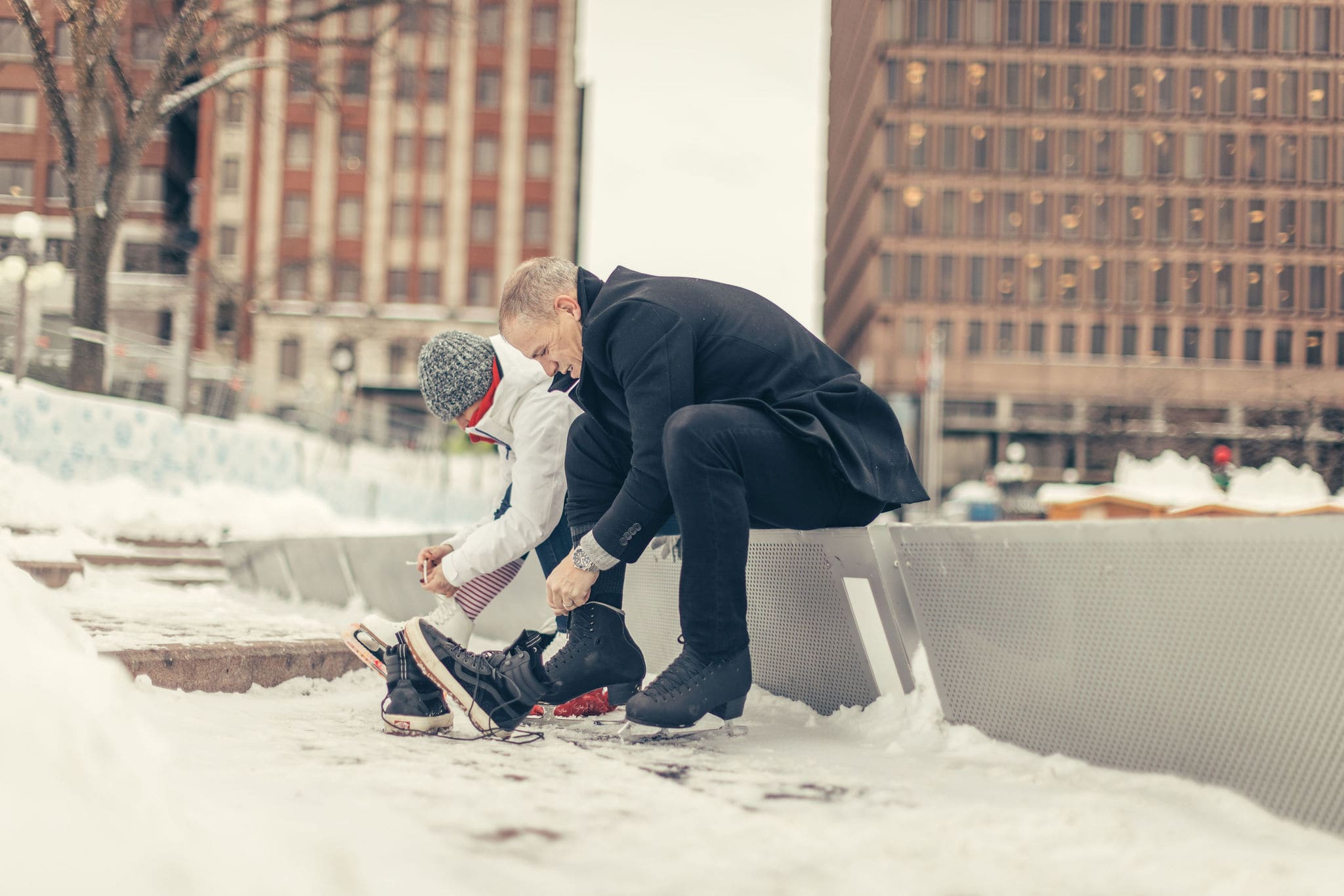 people putting on skates