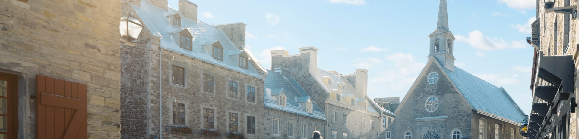 snowy town square with church