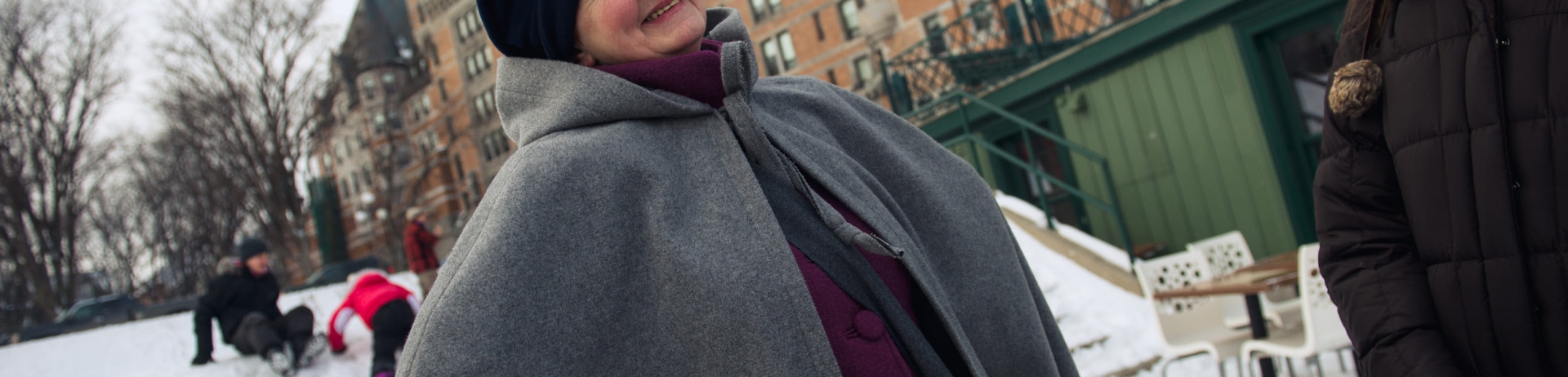 woman dressed up in historical garments in the winter