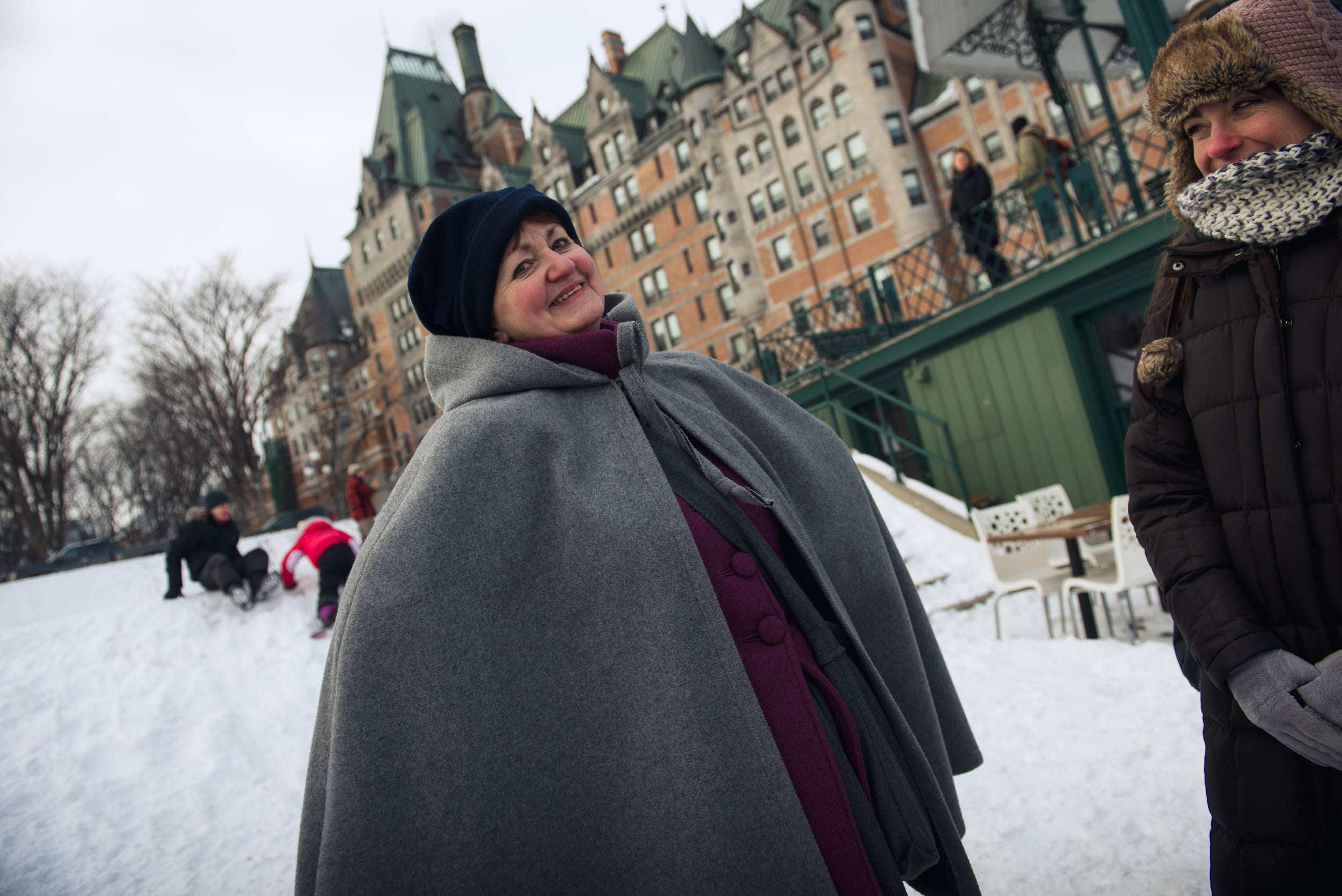 woman dressed up in historical garments in the winter