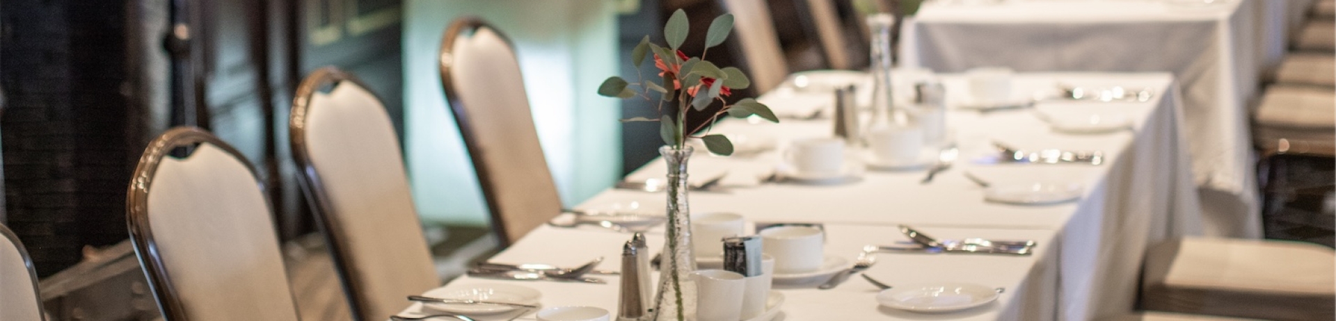 Table set for a holiday buffet in the Frontenac Room